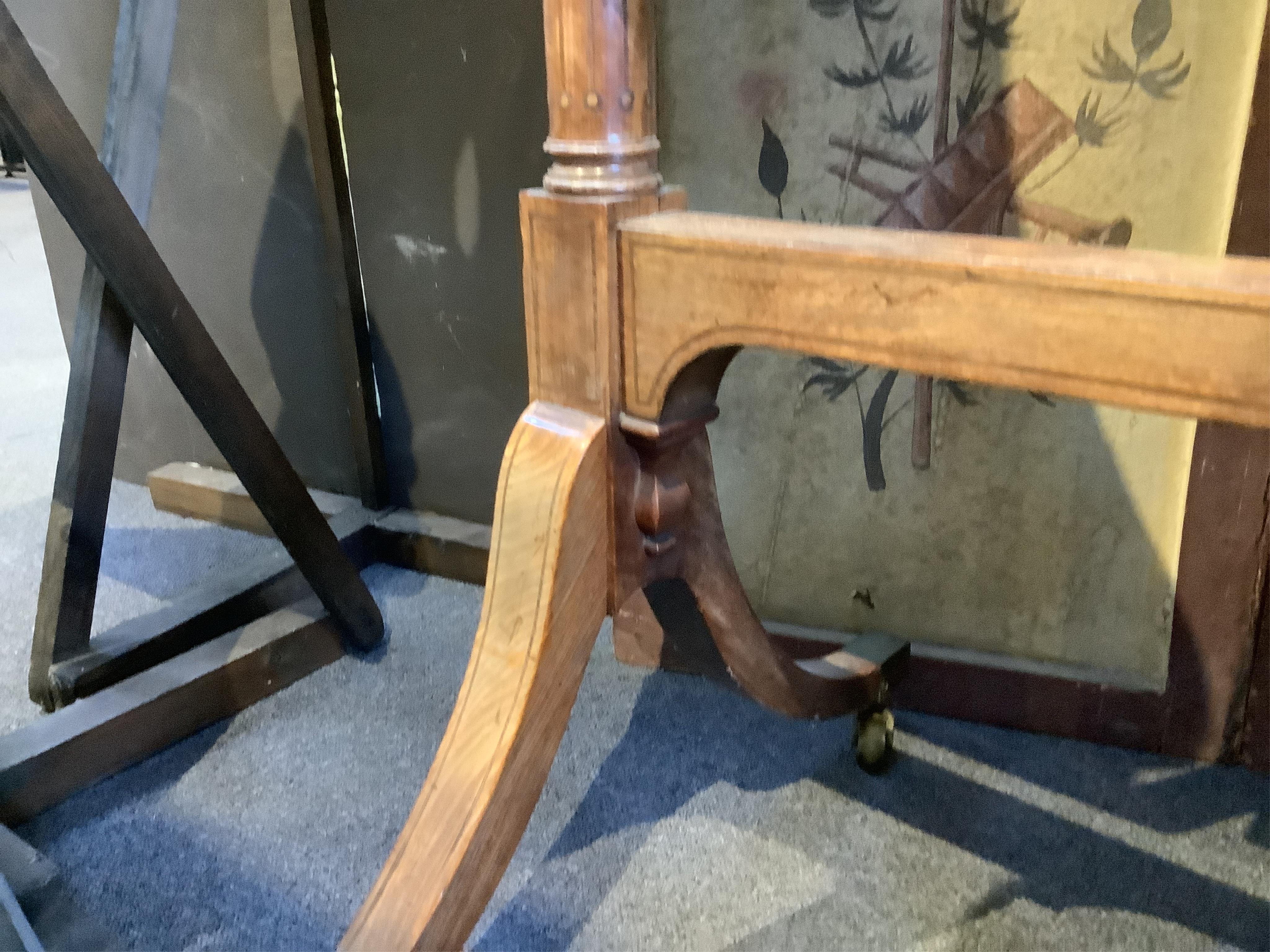 A Regency inlaid mahogany cheval mirror